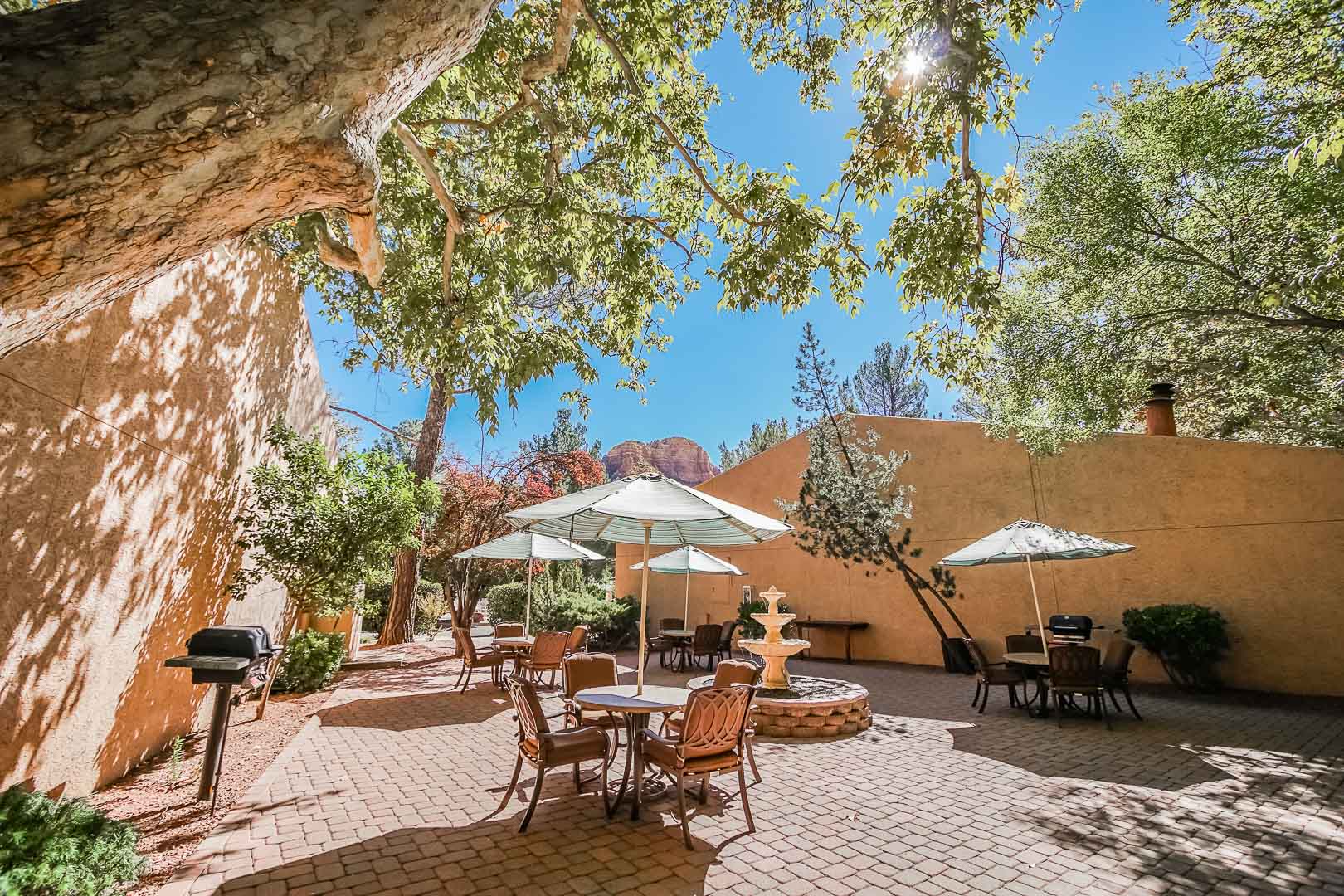 A peaceful view of the outdoor tables at VRI's Villas at Poco Diablo in Sedona, Arizona.
